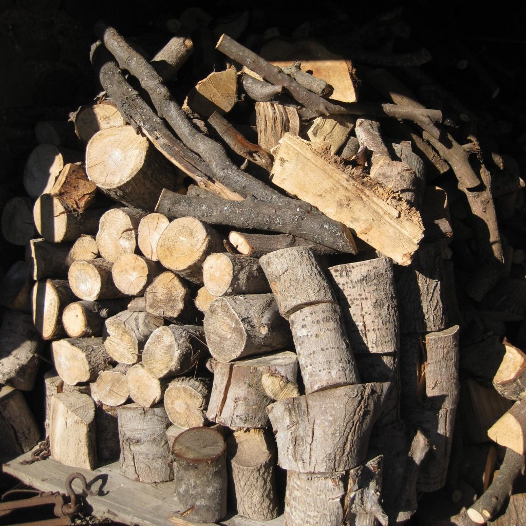 Pile of logs for wood burning stoves at Burnbrae eco-friendly holiday cottages