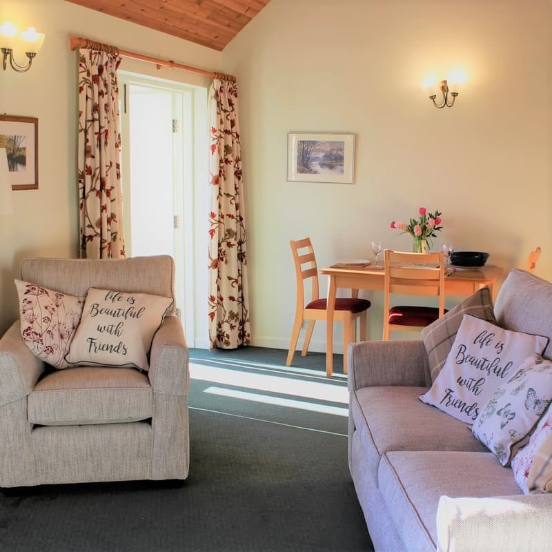 The dining area in Thairn cottage living room at Burnbrae Holidays