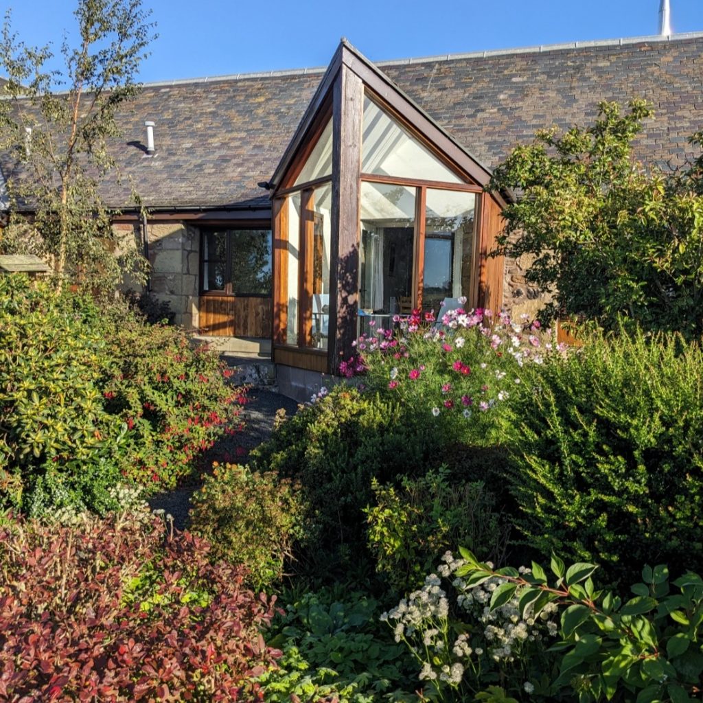 Mungo's Well Cottage, our cottage ideal for couples has a conservatory which overlooks the cottage garden. 