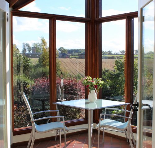 Relax in your south-facing conservatory with amazing rural views and wonderful birds on bird feeders.