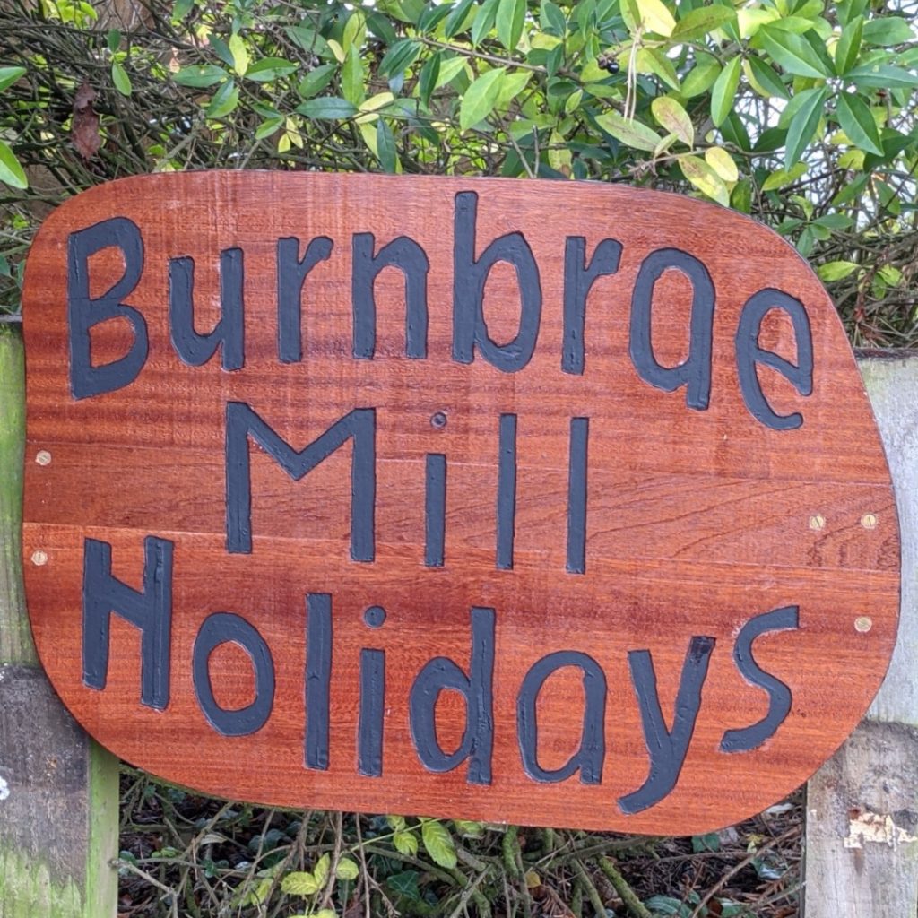 Burnbrae Holidays eco-friendly holiday cottages sign