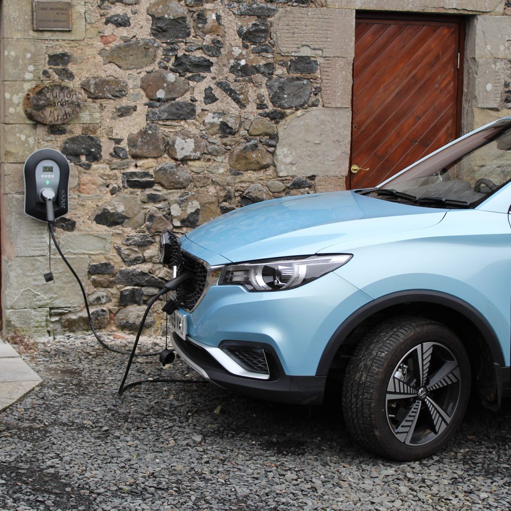 EV car charging outside Burnbrae eco-friendly holiday cottage