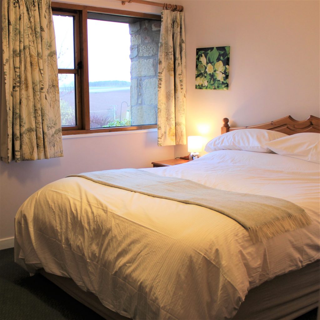 Thairn cottage has an extra long king size bed