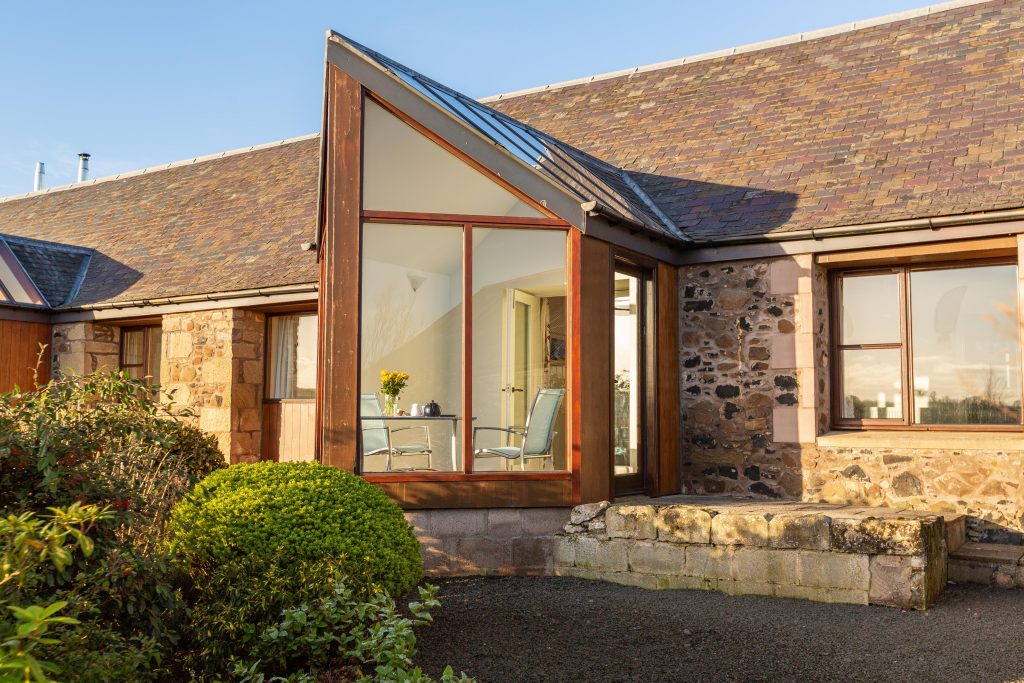 Thairn cottage patio and south facing conservatory